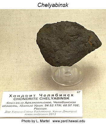 Photo of Chelyabinsk ordinary chondrite at the Fersman Mineralogical Museum.